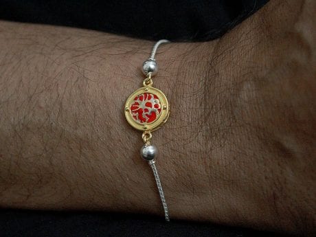 925 sterling silver chain rakhi bracelet with Gold-plated red enamel motif