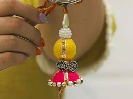 Beautifully hancrafted Lumba with attached 925 silver gift for bhabhi