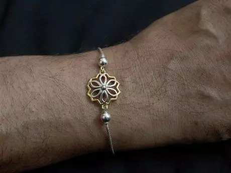 925 sterling silver rakhi chain bracelet with Gold-plated flower motif