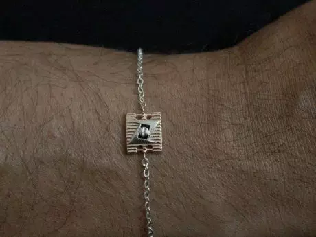 925 sterling silver rakhi chain bracelet with Rose Gold-plated motif