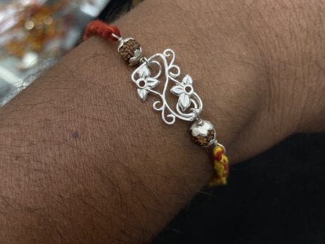 925 Silver Flower Motif Rakhi with Panchmukhi Rudraksha