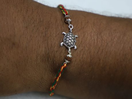 Braided Thread Rakhi with Pure Silver Tortoise Infused with Rudraksha