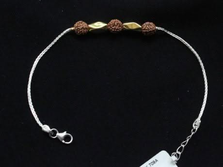 925 sterling silver rakhi chain bracelet with gold-plated beads and panchmukhi rudraksha