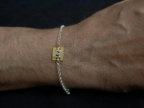 925 sterling silver rakhi chain bracelet with Gold-plated motif