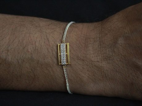925 sterling silver rakhi chain bracelet with Gold-plated Zercon motif