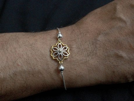 925 sterling silver rakhi chain bracelet with Gold-plated flower motif